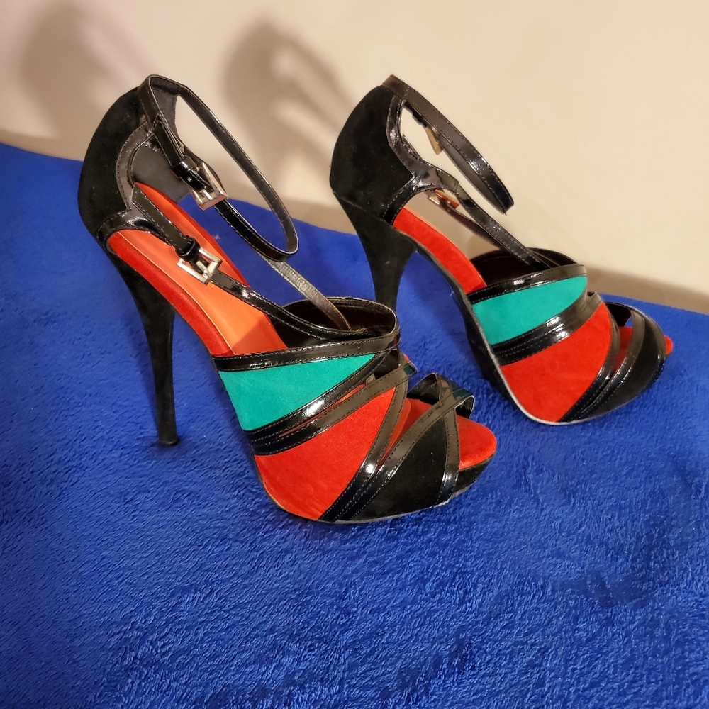 Used black, red, and green Beavty Heel
